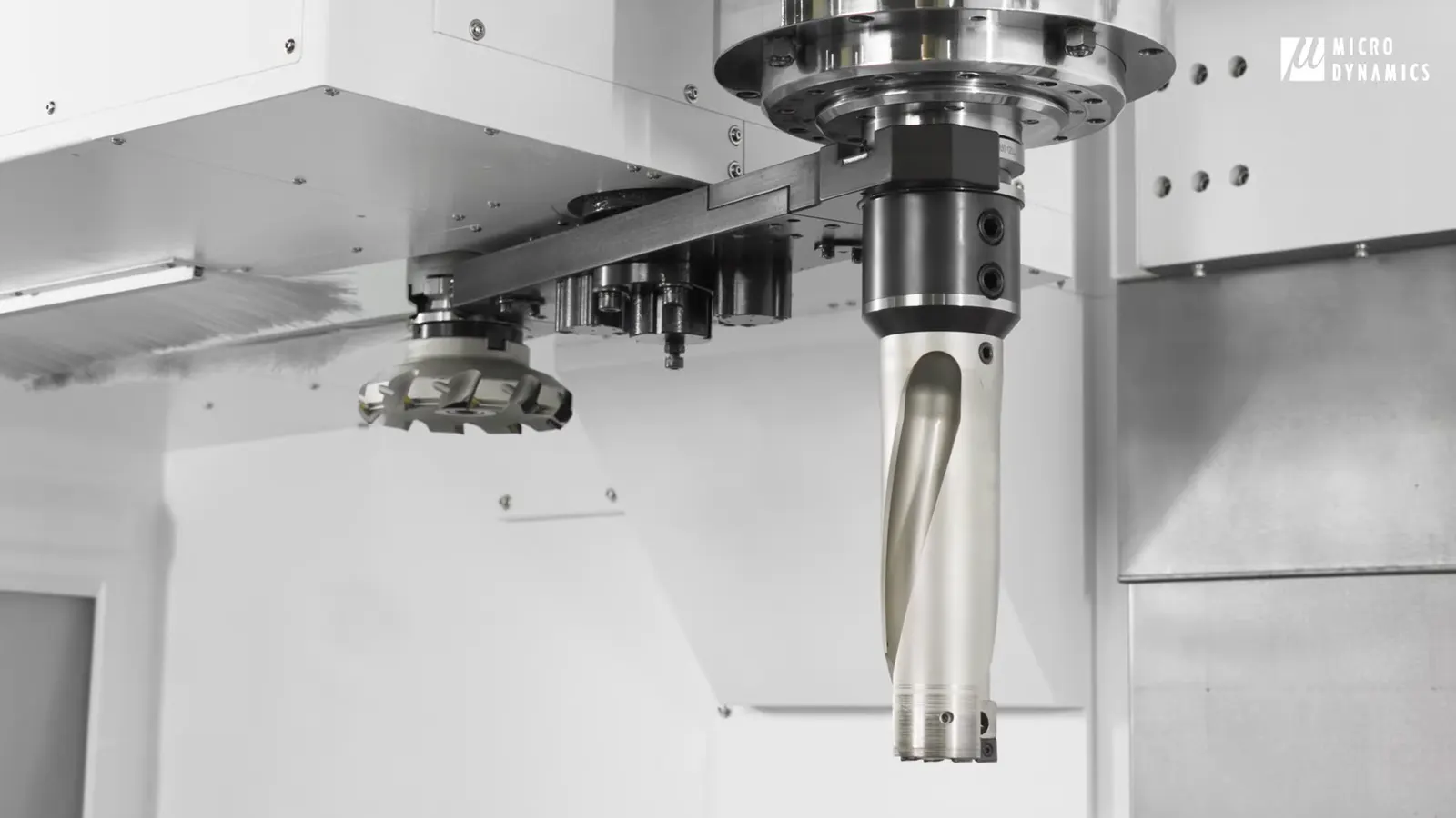High-speed double-arm ATC supports frequent tool changes with heavy tooling.