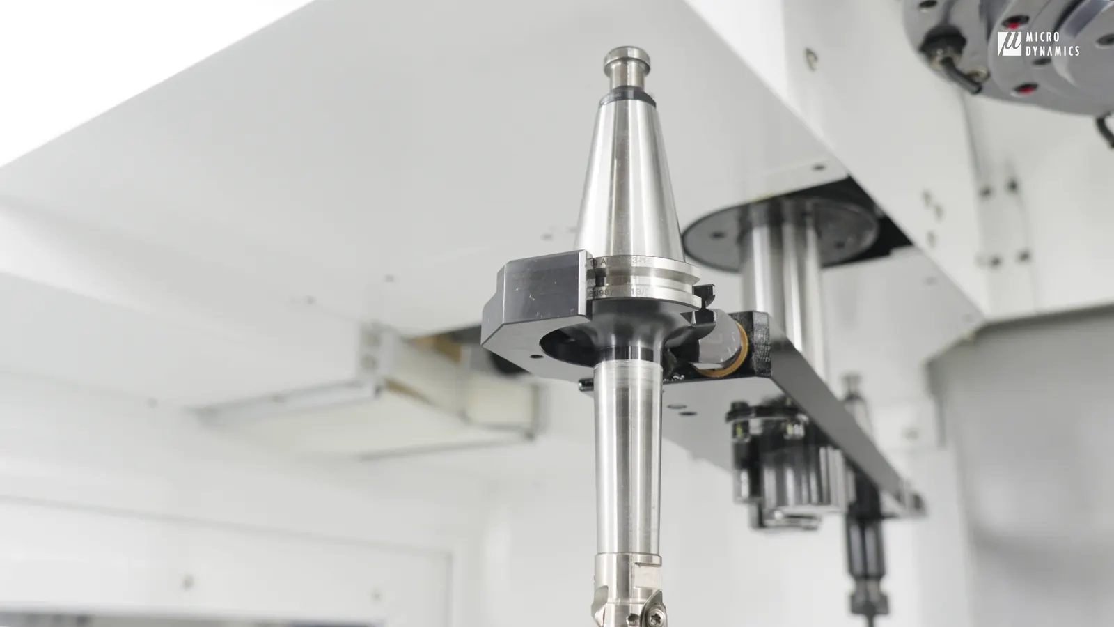 High-speed double-arm automatic tool changer mechanism on a vertical machining centre.