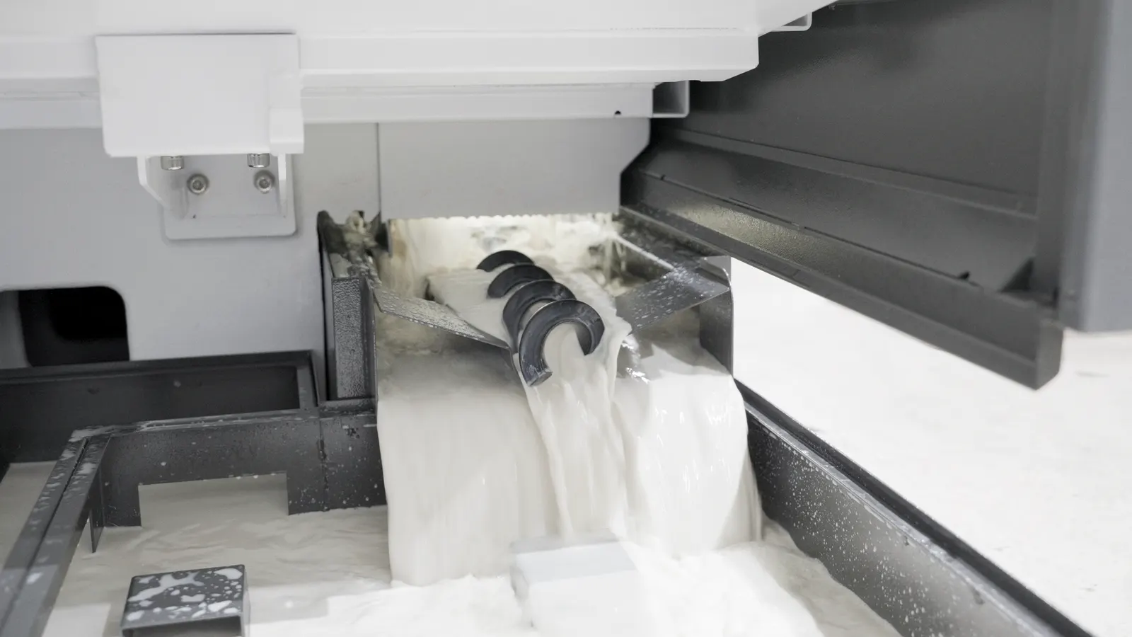 Auger (Screw) Conveyor of a MicroDynamics CNC Machine