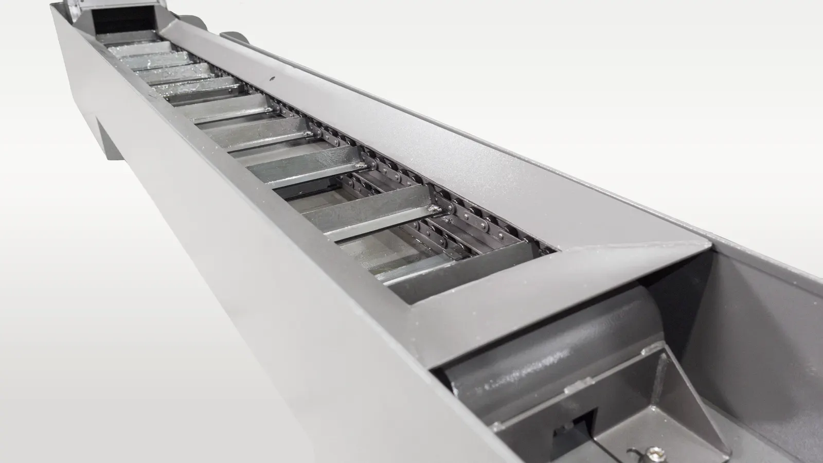 Scraper Chip Conveyor of a MicroDynamics CNC Machine