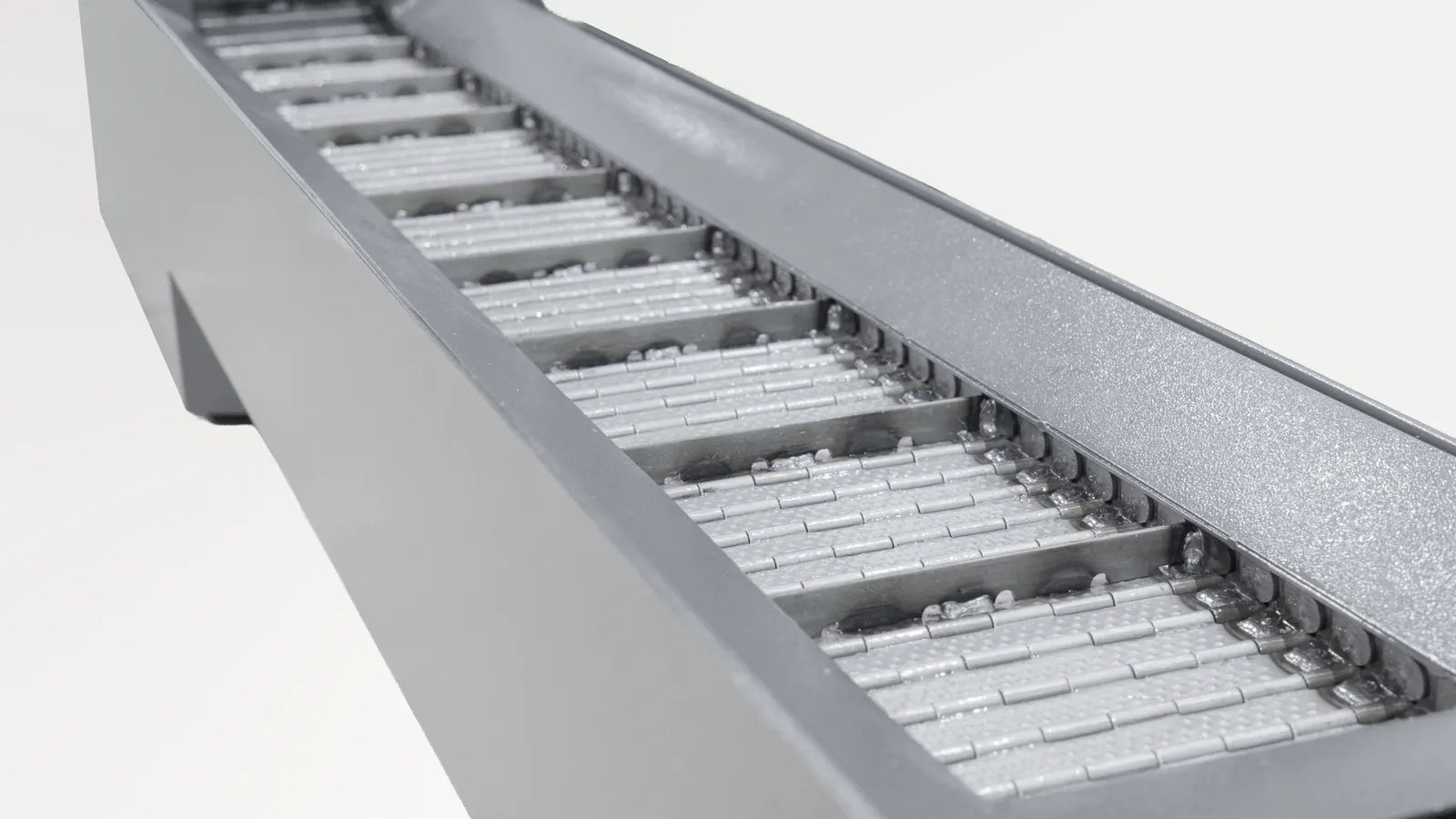 Hinge-Belt (Chain Type) Chip Conveyor of a MicroDynamics CNC Machine