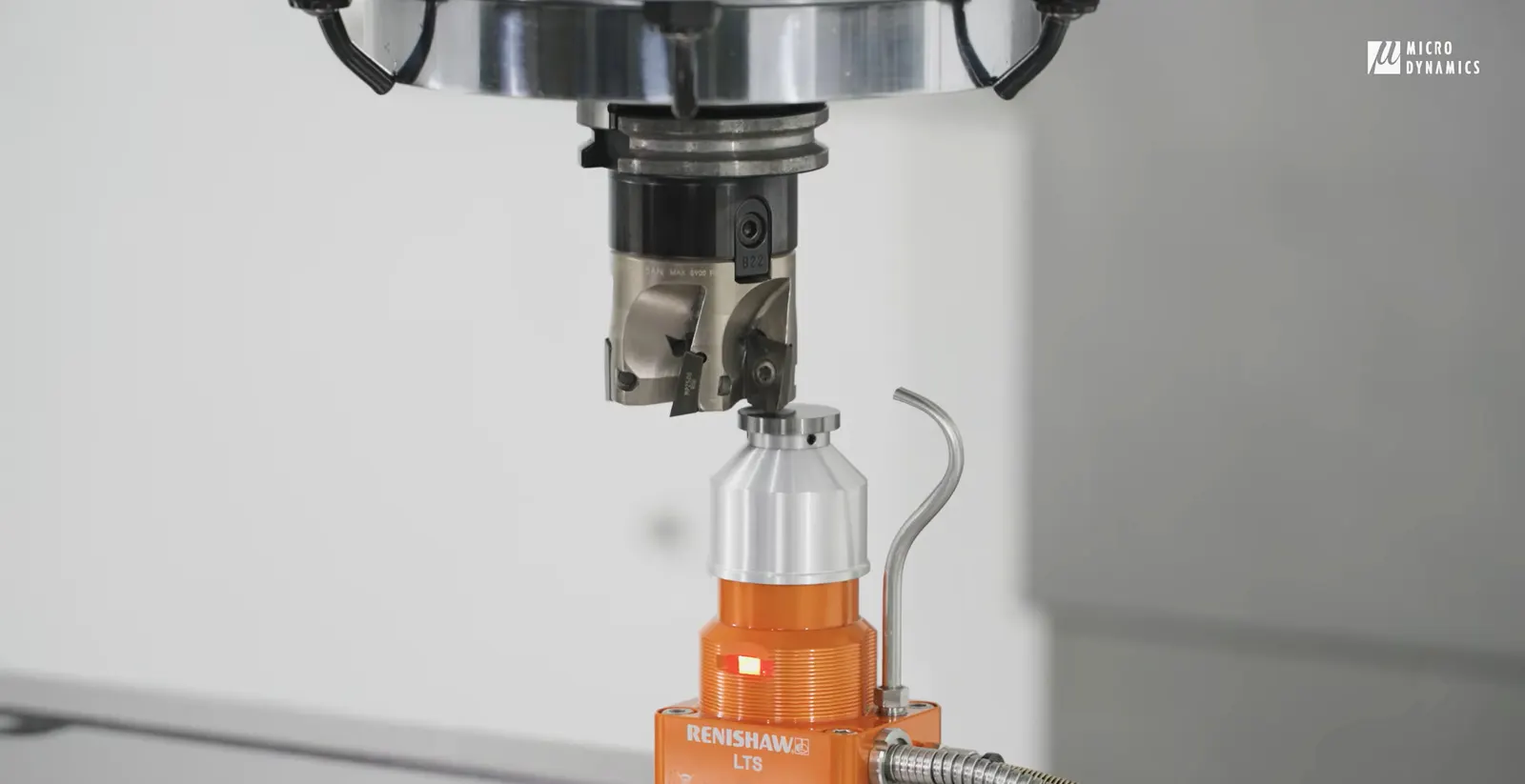 A Vertical Machining Center CNC Machine's Toll Getting Measured With A Renishaw Tool Setter