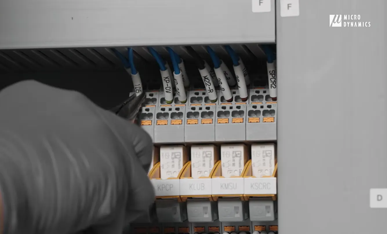 CNC Machine rear panel showing a relay being connected