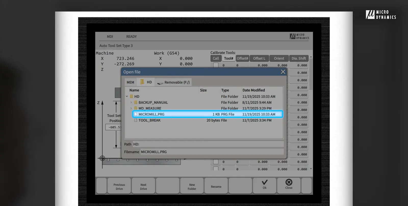 Press the "Tool" button on your keypad, press "Scan program" on your HMI screen, select the program and press "Ok" on Microdynamics cnc machine hmi