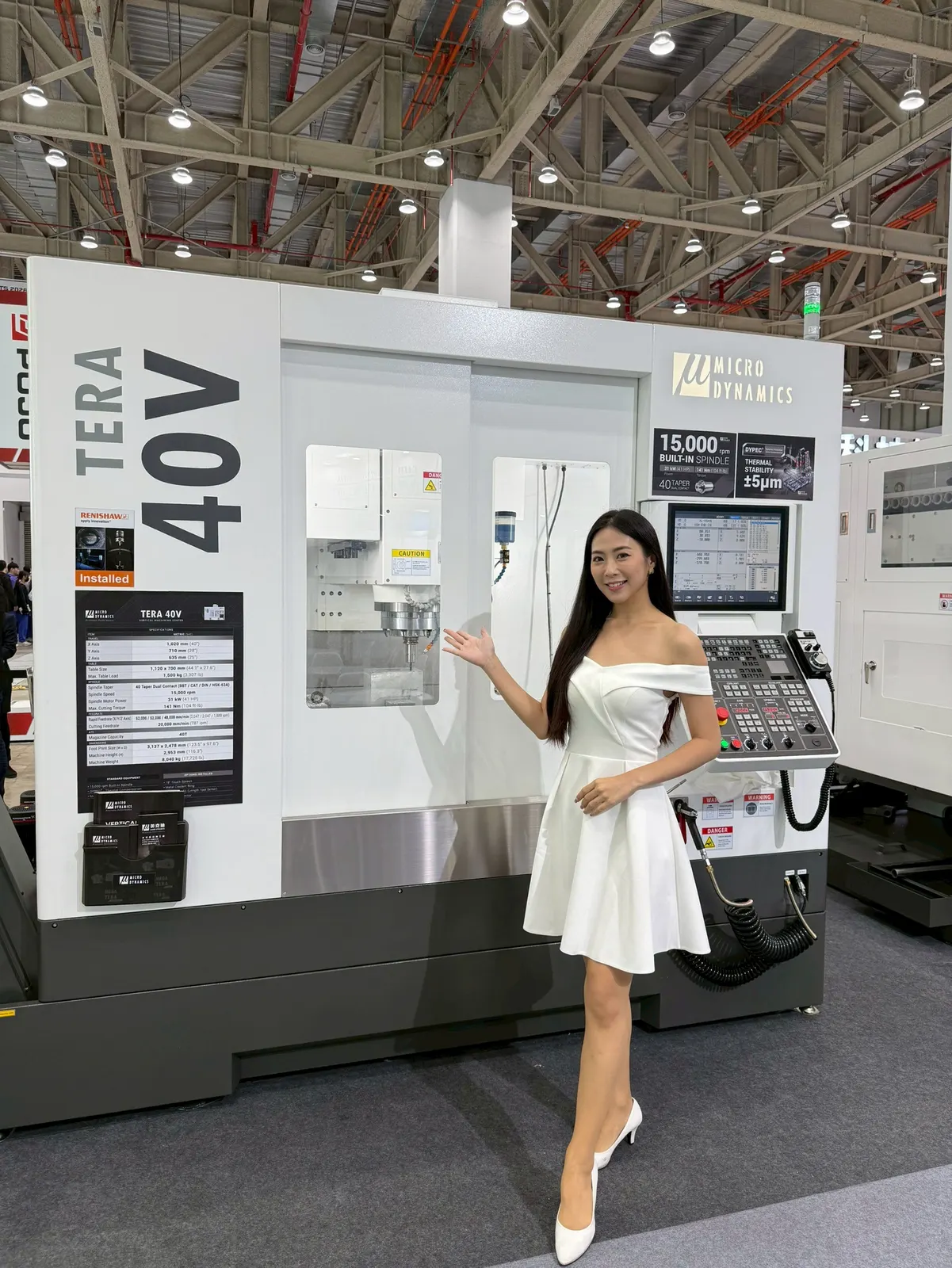 Female model presenting the MicroDynamics Tera 40V at TMTS 2026 Taichung International Convention and Exhibition Center